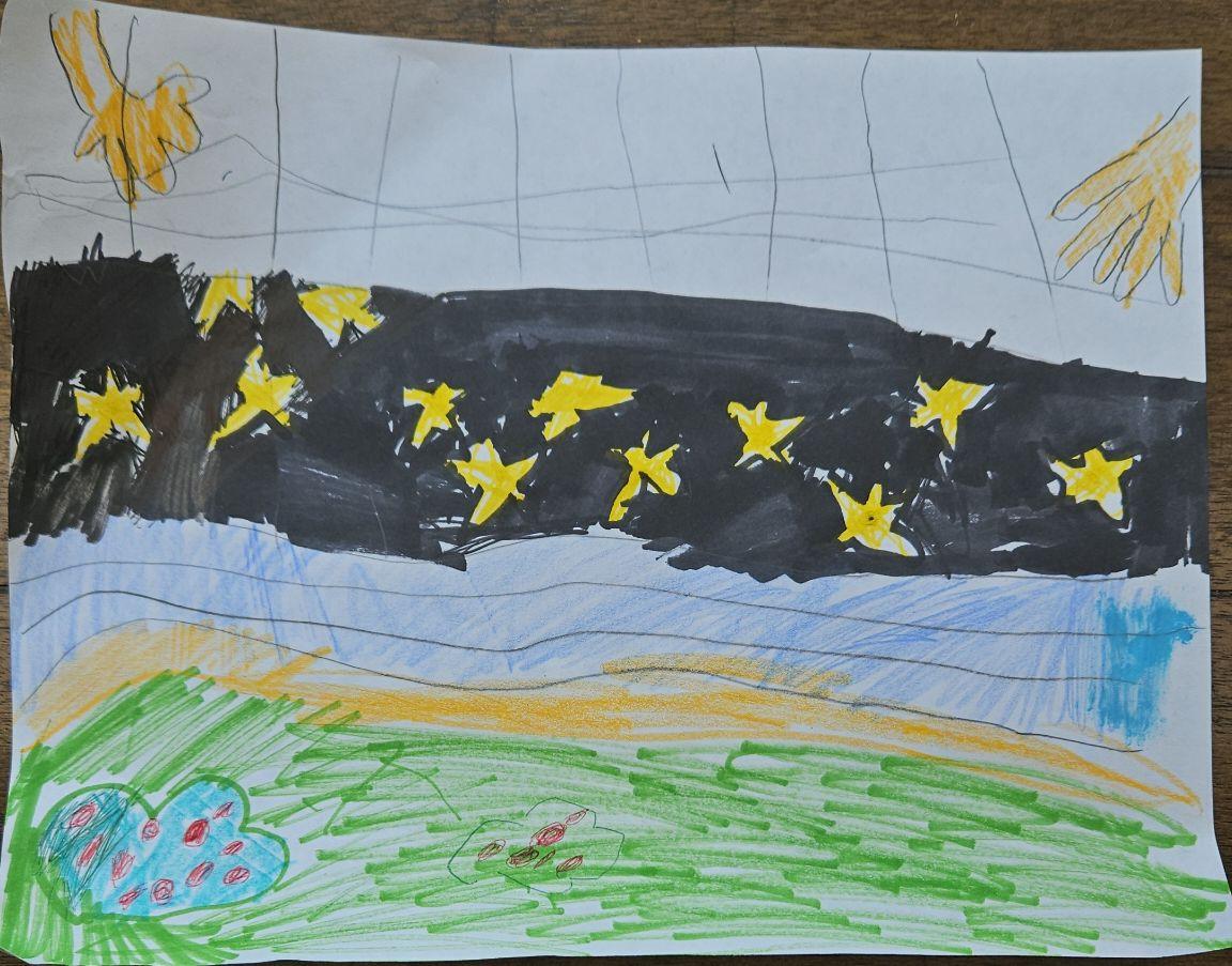 A child's drawing in marker and coloured pencil: a pale sky with a yellow sun in each upper corner, a wide black band scattered with yellow stars, then blue water, a line of yellow sand, and green grass with two berry bushes at the foot.